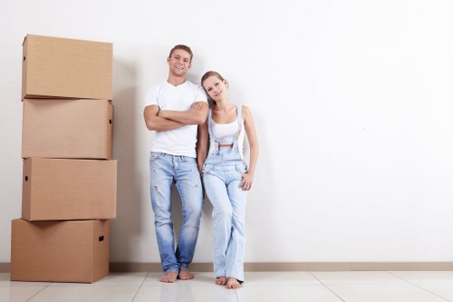 Removal team planning a flat move in a Docklands apartment building