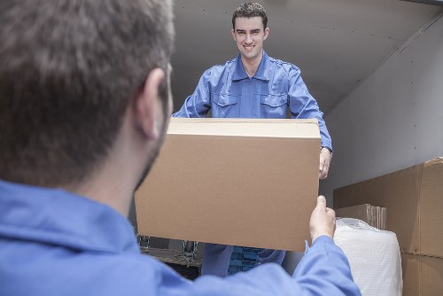 Removal team managing a same-day move in Docklands apartment access