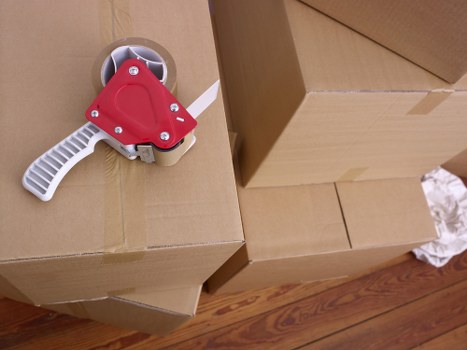 Local office removals team handling business equipment in Docklands
